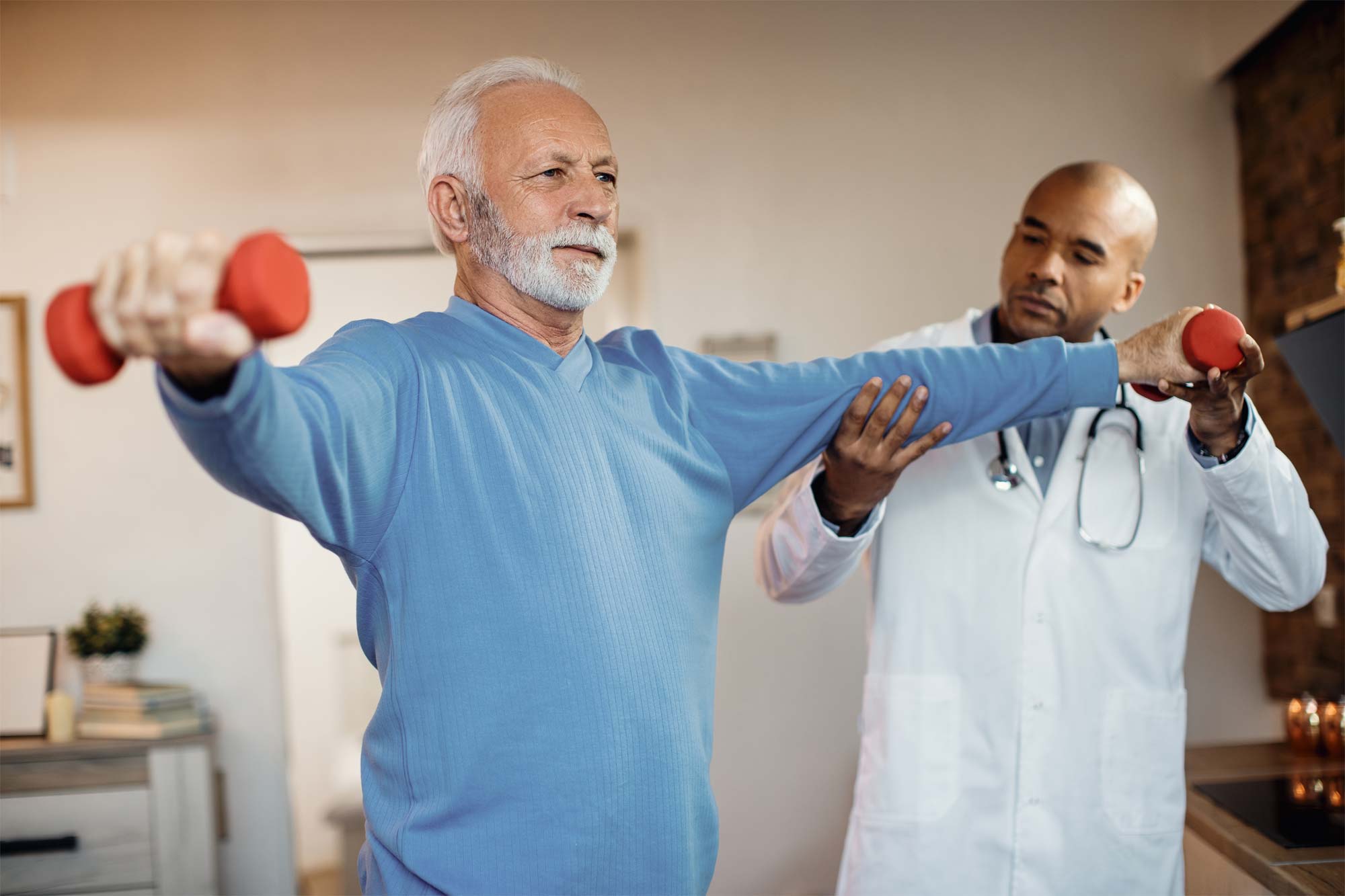 A senior exercises with weights
